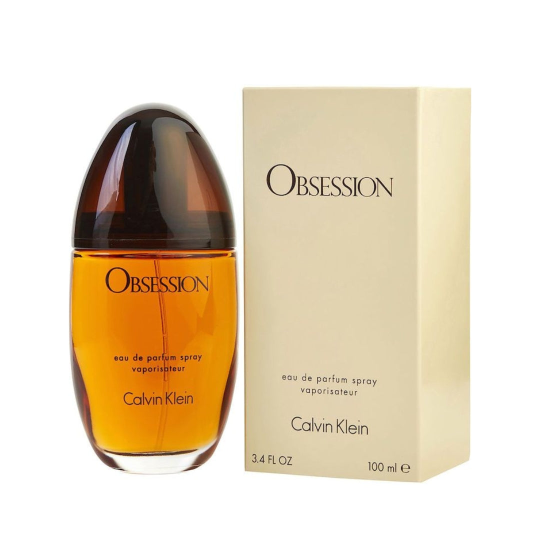 Calvin Klein Obsession 100ml EDP Female Perfume with box, a luxurious amber-hued fragrance ideal for romantic and elegant gift occasions.